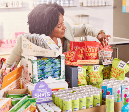 Welcome Your Team Back: Restocking Office Pantry Snacks women deciding which snack to eat