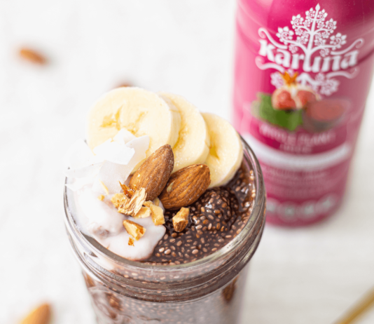 5 Healthy Treats for Every Day of The Work Week delicious smoothie in a jar topped with bananas and almonds