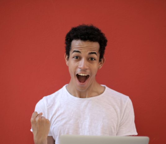 13 Congratulations Gifts to Celebrate Achievement Young man excited