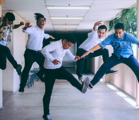 Fun and Easy Gifting Tactics to Increase Employee Retention employees jumping for joy in appreciation