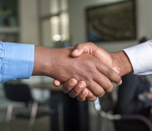 What is Sales Prospecting? And What Are the Best Practices in 2024? shaking hands