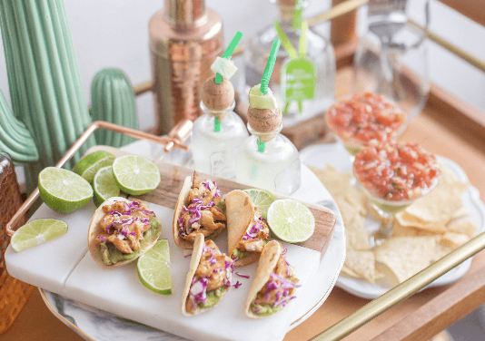 How to Gift Employees for Cinco de Mayo A large spread of Mexican food.