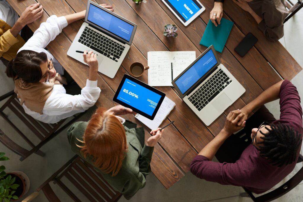 Employees at a table together working