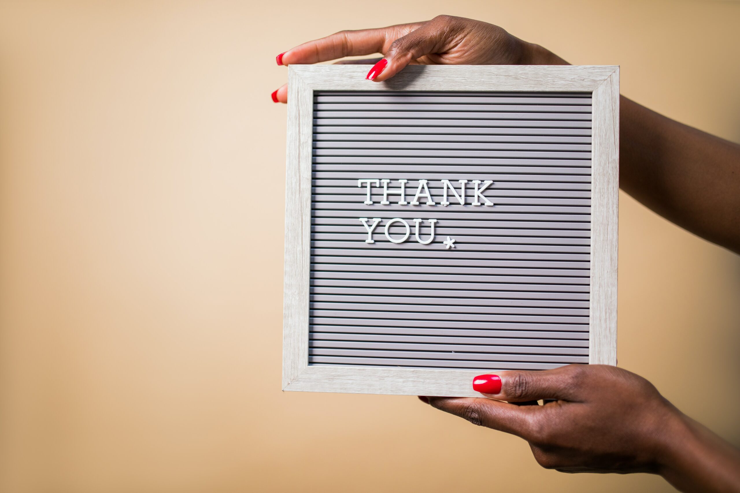 Thank you note written on board 